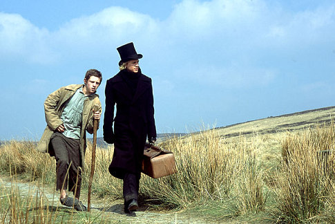 Jamie Bell as Smike and Charlie Hunnam as Nickleby