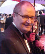 Jim arrives at the Leicester Square Odeon in the rain